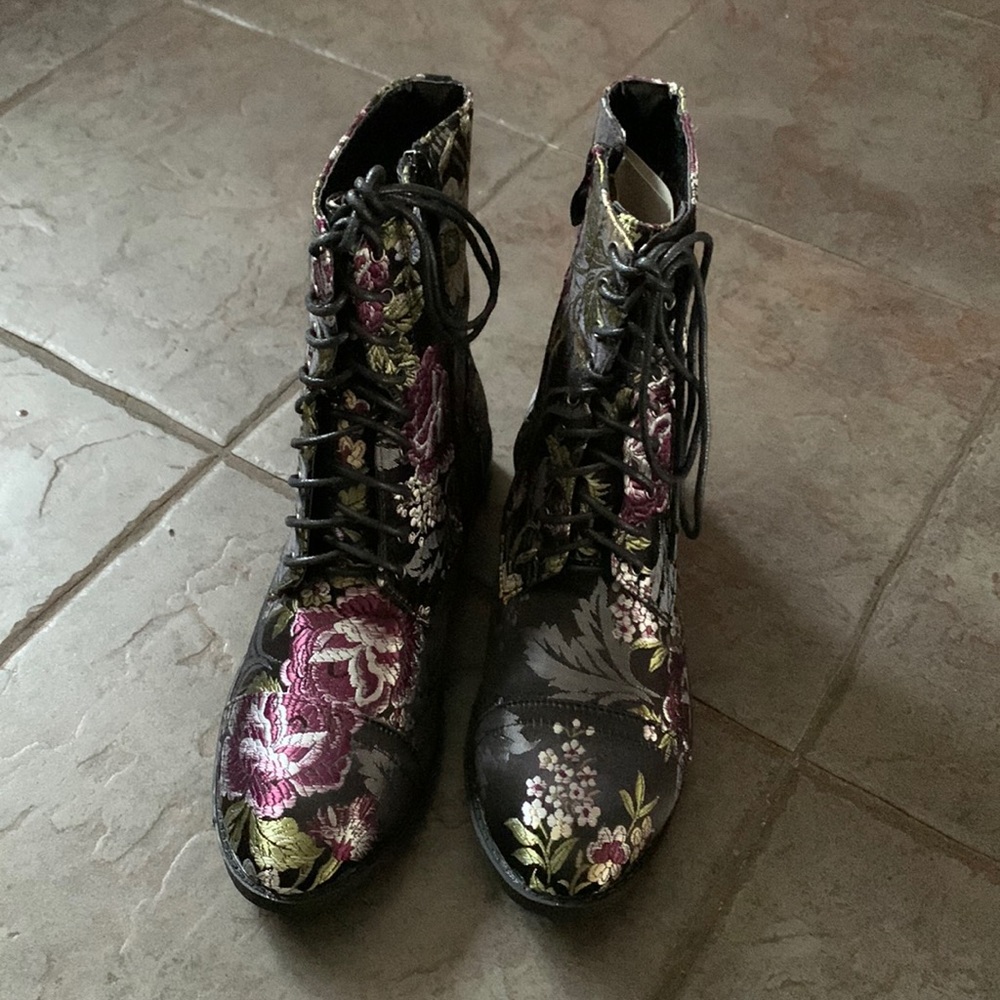 Boots with floral pattern New without tags. Never worn and really pretty.